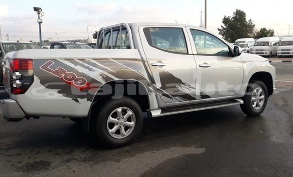 Buy Import Mitsubishi L200 White Car in Import - Dubai in Dushanbe Buy Import Mitsubishi L200 White Car in Import - Dubai in Dushanbe