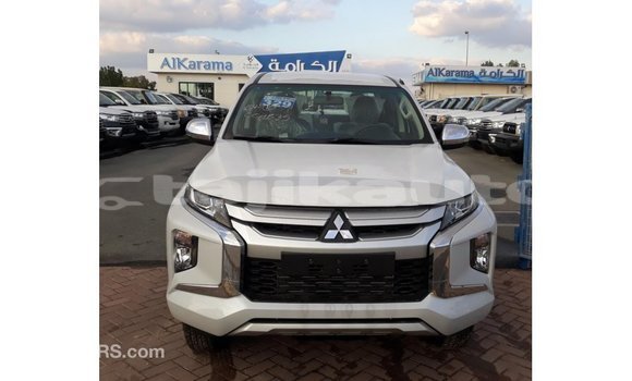 Buy Import Mitsubishi L200 White Car in Import - Dubai in Dushanbe Buy Import Mitsubishi L200 White Car in Import - Dubai in Dushanbe