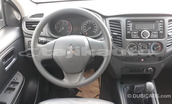 Buy Import Mitsubishi L200 White Car in Import - Dubai in Dushanbe Buy Import Mitsubishi L200 White Car in Import - Dubai in Dushanbe