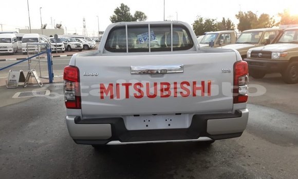 Buy Import Mitsubishi L200 White Car in Import - Dubai in Dushanbe Buy Import Mitsubishi L200 White Car in Import - Dubai in Dushanbe