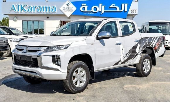 Buy Import Mitsubishi L200 White Car in Import - Dubai in Dushanbe Buy Import Mitsubishi L200 White Car in Import - Dubai in Dushanbe