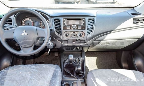 Buy Import Mitsubishi L200 White Car in Import - Dubai in Dushanbe Buy Import Mitsubishi L200 White Car in Import - Dubai in Dushanbe
