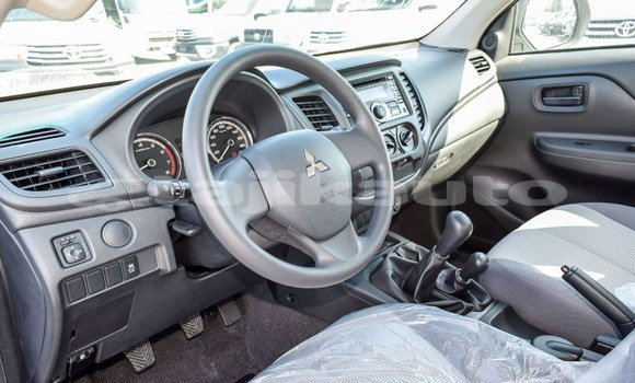 Buy Import Mitsubishi L200 White Car in Import - Dubai in Dushanbe Buy Import Mitsubishi L200 White Car in Import - Dubai in Dushanbe