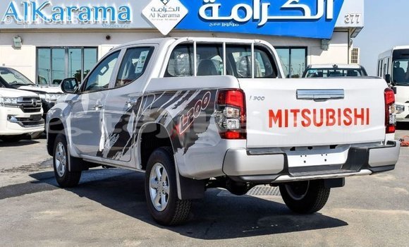 Buy Import Mitsubishi L200 White Car in Import - Dubai in Dushanbe Buy Import Mitsubishi L200 White Car in Import - Dubai in Dushanbe