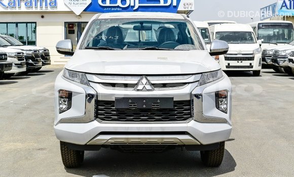 Buy Import Mitsubishi L200 White Car in Import - Dubai in Dushanbe Buy Import Mitsubishi L200 White Car in Import - Dubai in Dushanbe