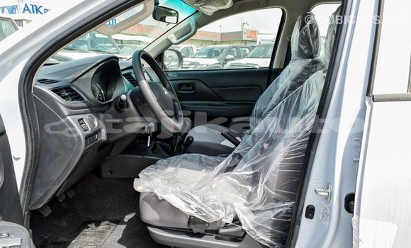 Buy Import Mitsubishi L200 White Car in Import - Dubai in Dushanbe Buy Import Mitsubishi L200 White Car in Import - Dubai in Dushanbe