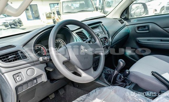 Buy Import Mitsubishi L200 White Car in Import - Dubai in Dushanbe Buy Import Mitsubishi L200 White Car in Import - Dubai in Dushanbe
