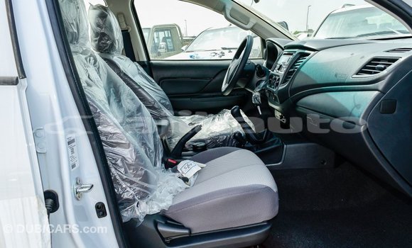 Buy Import Mitsubishi L200 White Car in Import - Dubai in Dushanbe Buy Import Mitsubishi L200 White Car in Import - Dubai in Dushanbe