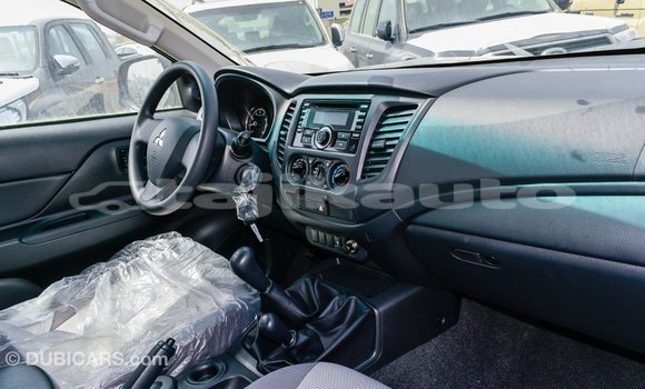 Buy Import Mitsubishi L200 White Car in Import - Dubai in Dushanbe Buy Import Mitsubishi L200 White Car in Import - Dubai in Dushanbe