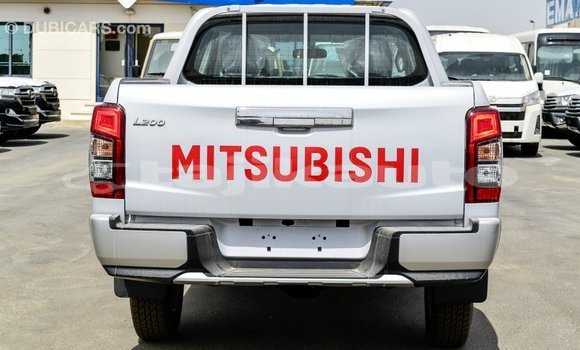 Buy Import Mitsubishi L200 White Car in Import - Dubai in Dushanbe Buy Import Mitsubishi L200 White Car in Import - Dubai in Dushanbe