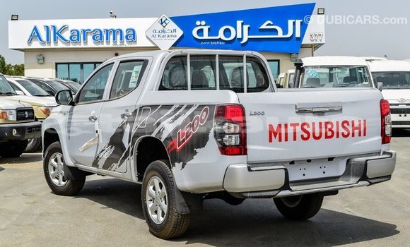 Buy Import Mitsubishi L200 White Car in Import - Dubai in Dushanbe Buy Import Mitsubishi L200 White Car in Import - Dubai in Dushanbe