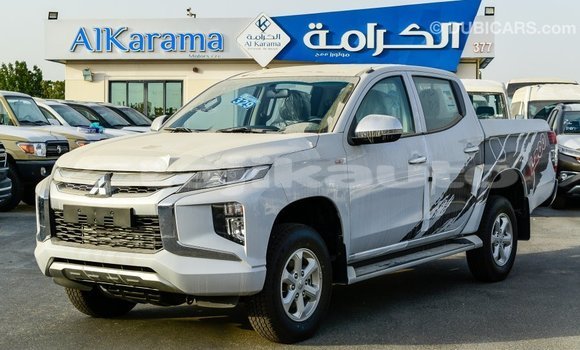 Buy Import Mitsubishi L200 White Car in Import - Dubai in Dushanbe Buy Import Mitsubishi L200 White Car in Import - Dubai in Dushanbe