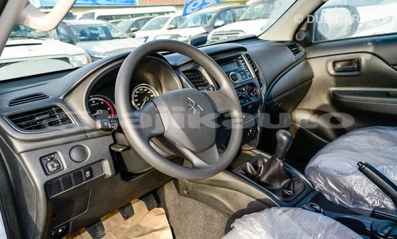 Buy Import Mitsubishi L200 White Car in Import - Dubai in Dushanbe Buy Import Mitsubishi L200 White Car in Import - Dubai in Dushanbe