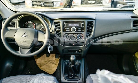 Buy Import Mitsubishi L200 White Car in Import - Dubai in Dushanbe Buy Import Mitsubishi L200 White Car in Import - Dubai in Dushanbe