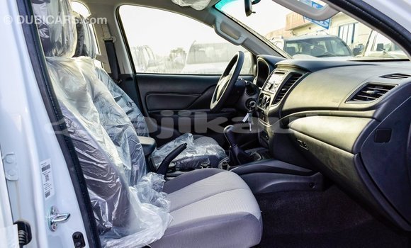 Buy Import Mitsubishi L200 White Car in Import - Dubai in Dushanbe Buy Import Mitsubishi L200 White Car in Import - Dubai in Dushanbe