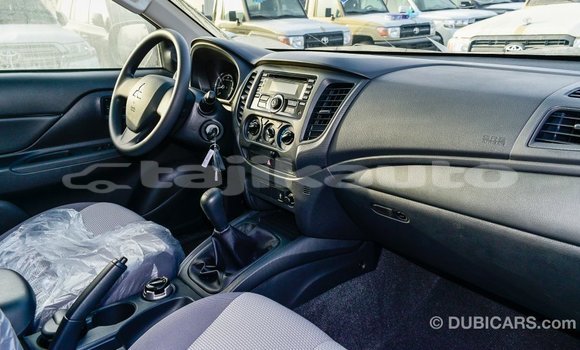 Buy Import Mitsubishi L200 White Car in Import - Dubai in Dushanbe Buy Import Mitsubishi L200 White Car in Import - Dubai in Dushanbe