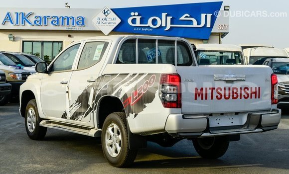 Buy Import Mitsubishi L200 White Car in Import - Dubai in Dushanbe Buy Import Mitsubishi L200 White Car in Import - Dubai in Dushanbe