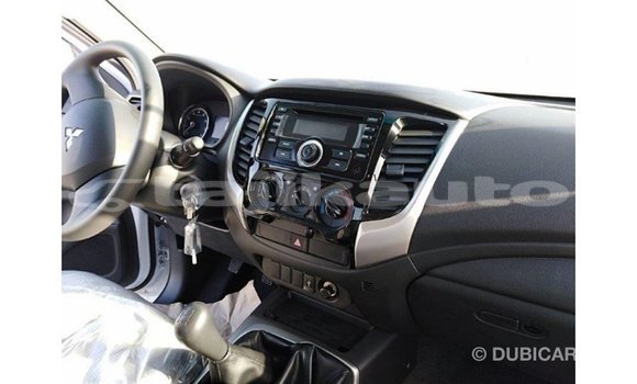 Buy Import Mitsubishi L200 White Car in Import - Dubai in Dushanbe Buy Import Mitsubishi L200 White Car in Import - Dubai in Dushanbe