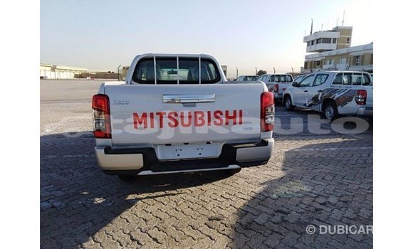Buy Import Mitsubishi L200 White Car in Import - Dubai in Dushanbe Buy Import Mitsubishi L200 White Car in Import - Dubai in Dushanbe