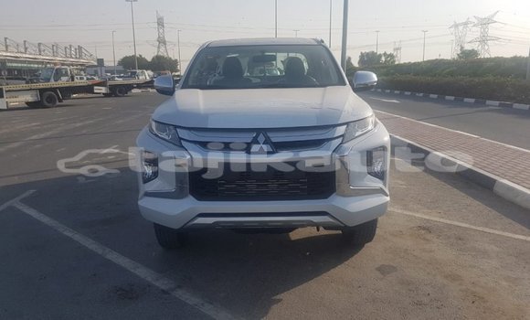 Buy Import Mitsubishi L200 White Car in Import - Dubai in Dushanbe Buy Import Mitsubishi L200 White Car in Import - Dubai in Dushanbe