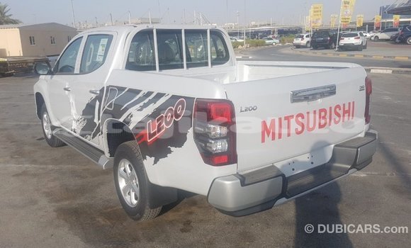 Buy Import Mitsubishi L200 White Car in Import - Dubai in Dushanbe Buy Import Mitsubishi L200 White Car in Import - Dubai in Dushanbe