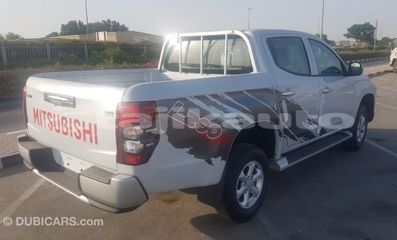 Buy Import Mitsubishi L200 White Car in Import - Dubai in Dushanbe Buy Import Mitsubishi L200 White Car in Import - Dubai in Dushanbe