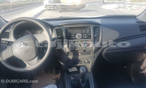 Buy Import Mitsubishi L200 White Car in Import - Dubai in Dushanbe Buy Import Mitsubishi L200 White Car in Import - Dubai in Dushanbe