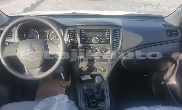 Buy Import Mitsubishi L200 White Car in Import - Dubai in Dushanbe Buy Import Mitsubishi L200 White Car in Import - Dubai in Dushanbe