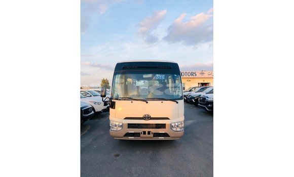Buy Import Toyota Coaster White Car in Import - Dubai in Dushanbe