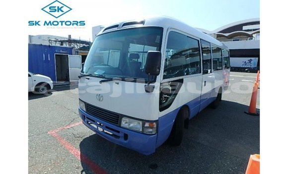 Buy Import Toyota Coaster White Car in Import - Dubai in Dushanbe