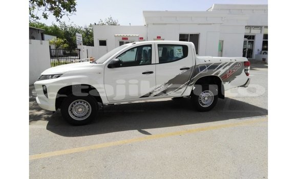 Buy Import Mitsubishi L200 White Car in Import - Dubai in Dushanbe Buy Import Mitsubishi L200 White Car in Import - Dubai in Dushanbe