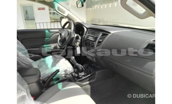 Buy Import Mitsubishi L200 White Car in Import - Dubai in Dushanbe Buy Import Mitsubishi L200 White Car in Import - Dubai in Dushanbe