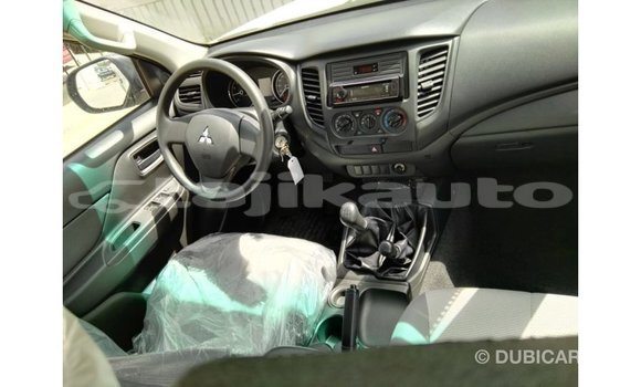 Buy Import Mitsubishi L200 White Car in Import - Dubai in Dushanbe Buy Import Mitsubishi L200 White Car in Import - Dubai in Dushanbe